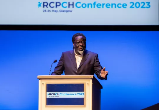 Professional man speaking at podium 