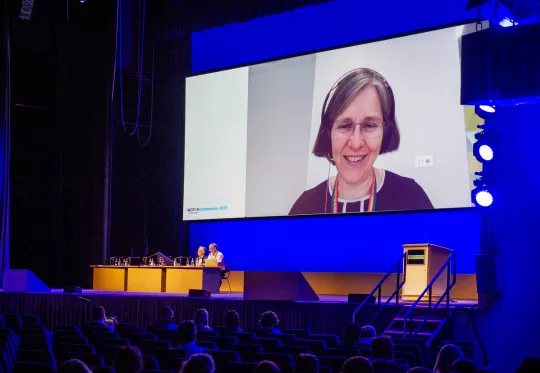 Online image of woman shown on screen