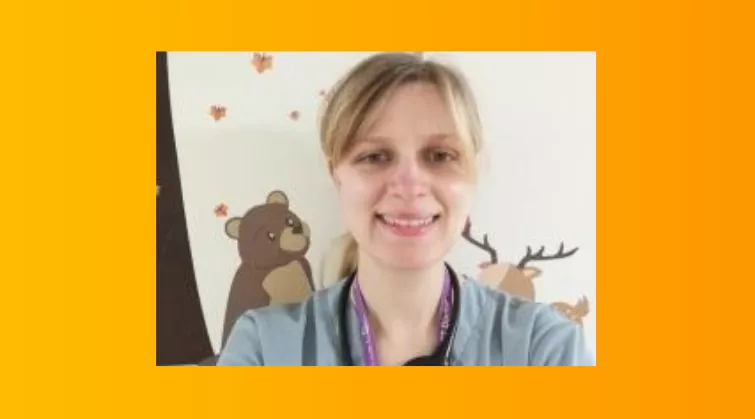 Katarina Stefkova, in front of mural at hospital