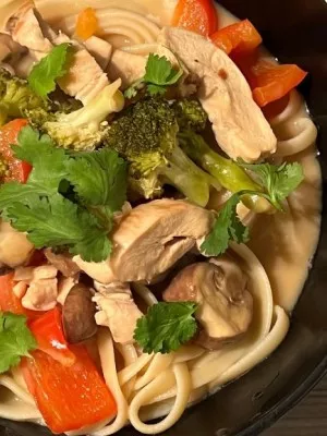 Close up of broccoli, coconut and lime Thai-Italian fusion