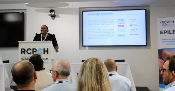 Melanie David-Feveck on stage at the Epilepsy12 conference. 