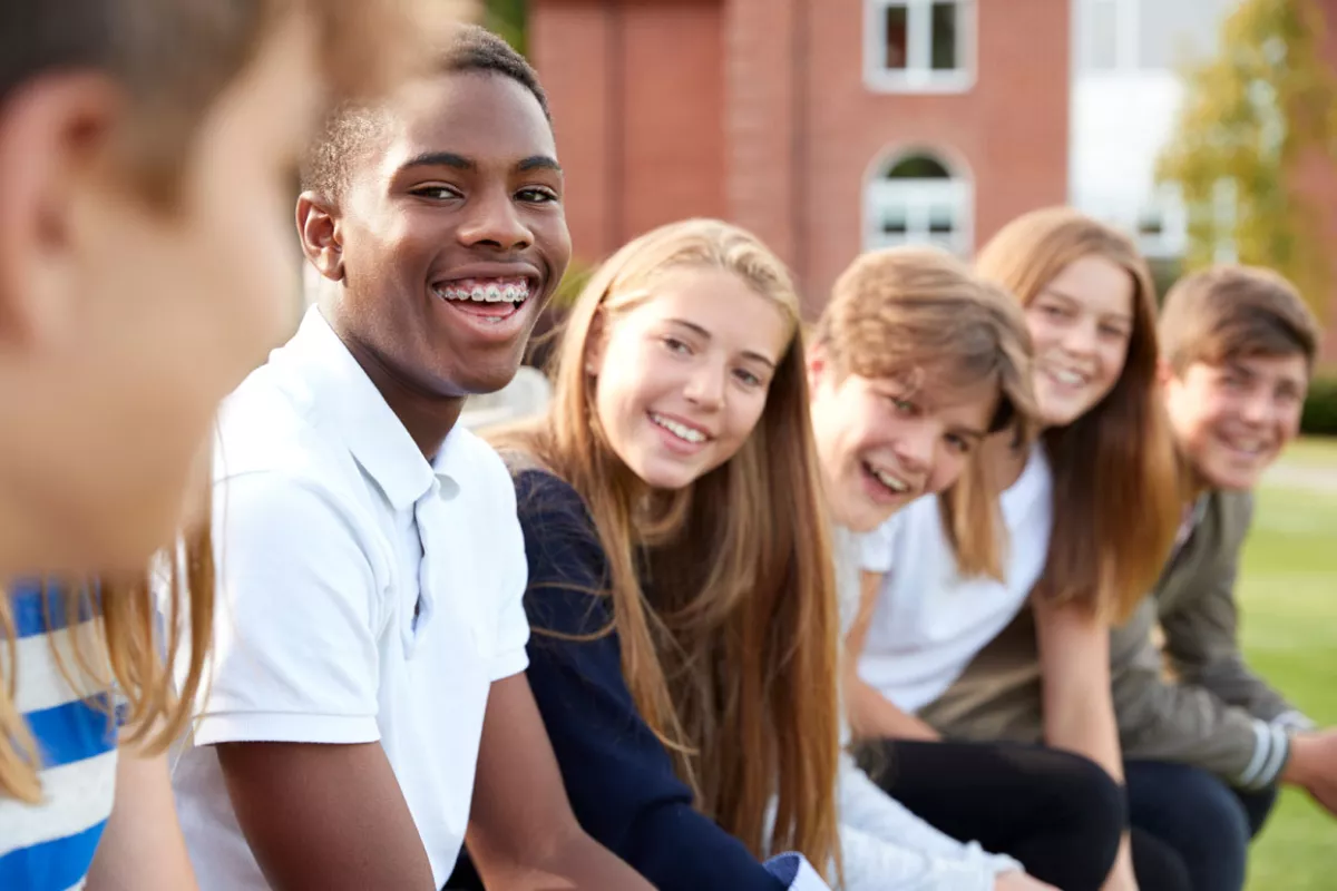 Group of smiling teenagers