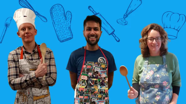 The three presenters with their aprons and wooden spoons at the ready 