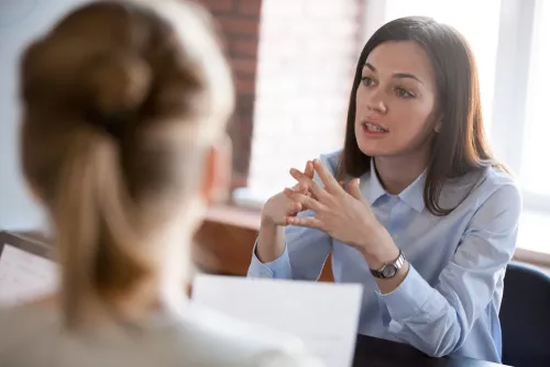 Woman speaking to panel