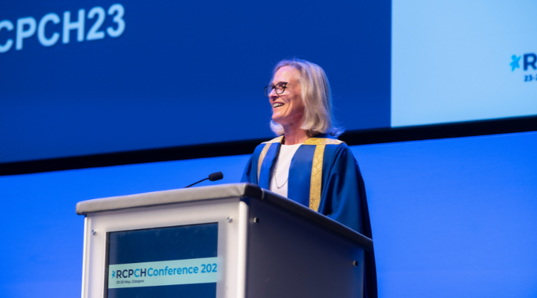 RCPCH President Camilla Kingdon standing at a podium whilst speaking at Conference