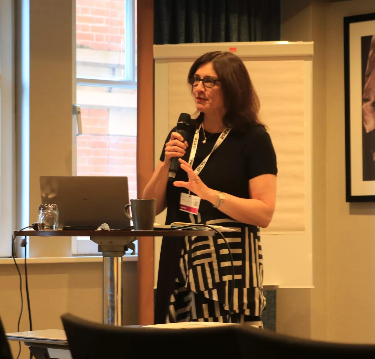 Dr Sophia Varadkar welcoming guests to the 2024 E12 OPEN UK Conference 