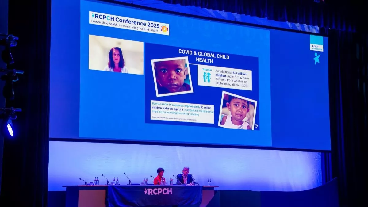 Presentation slide with live feed from keynote speaker Professor Monica Lakhanpaul on the impact of COVID-19 on children around the world