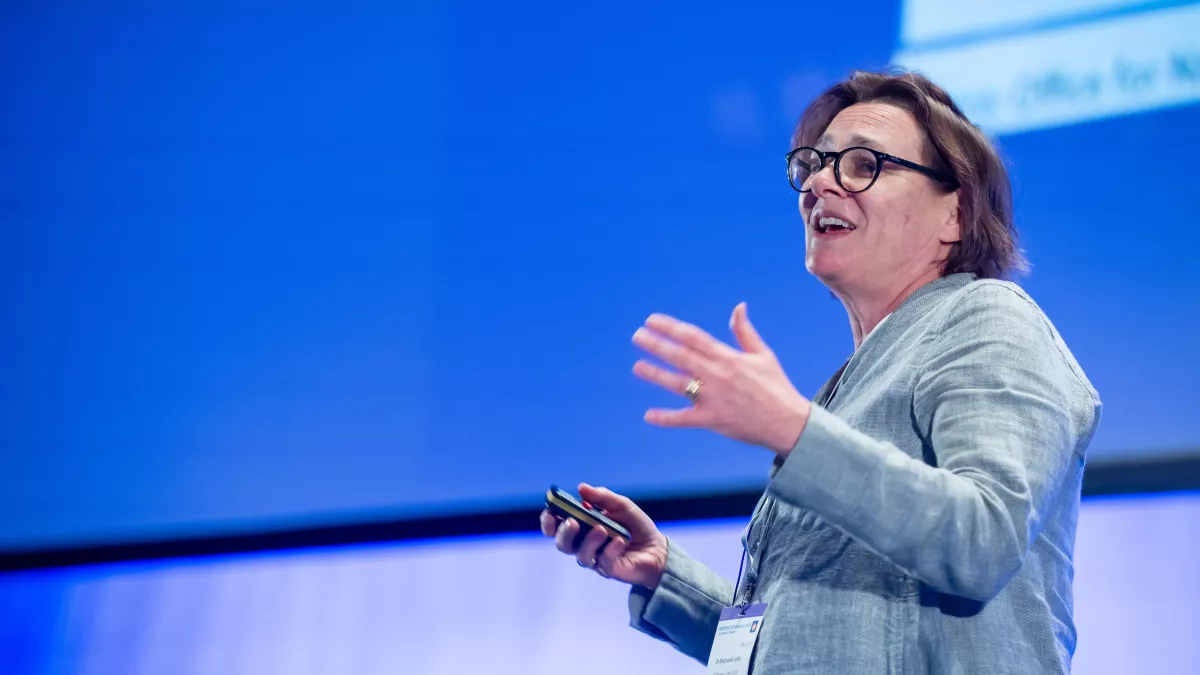 Stephanie Lamb speaking on stage