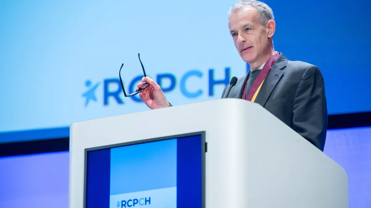 Steve Turner speaking on stage