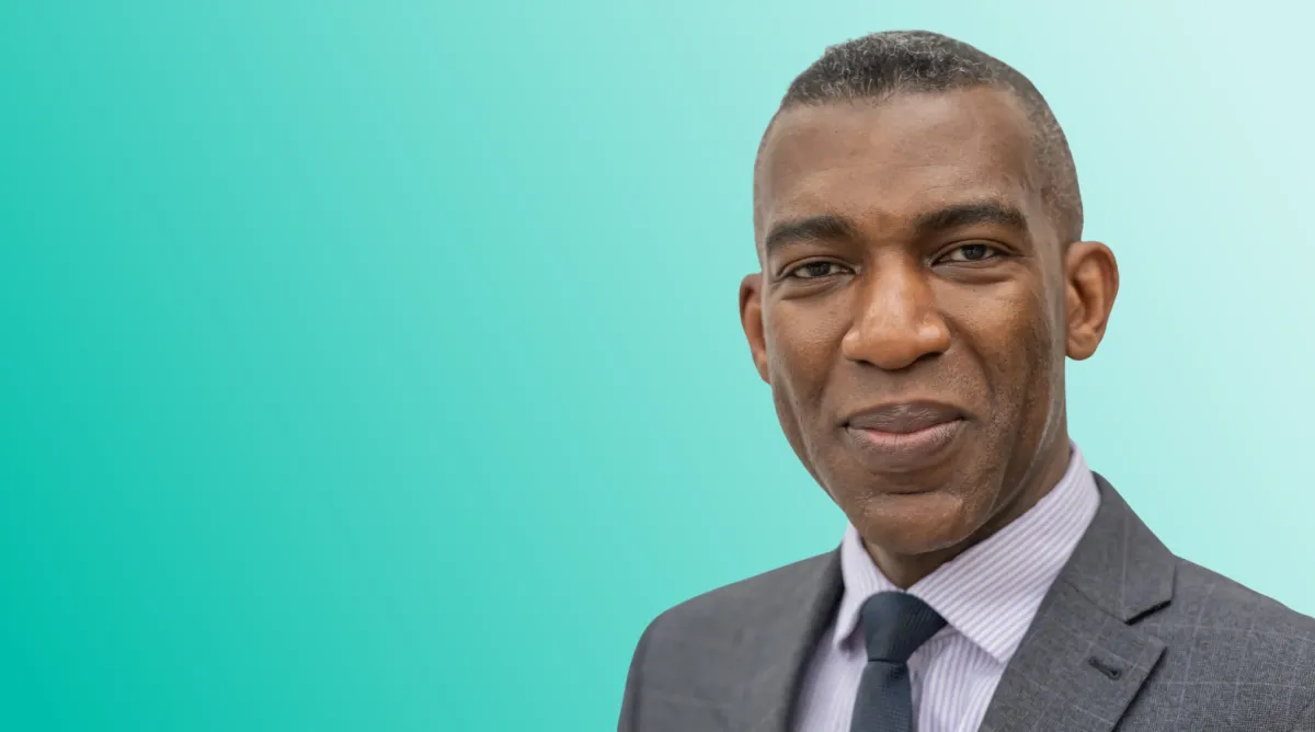 Headshot photo of Rob Okunnu