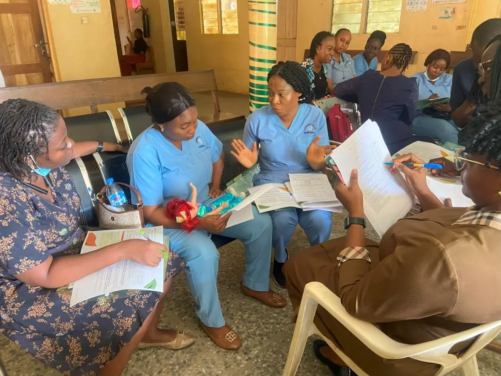 Group of health professionals teaching each other