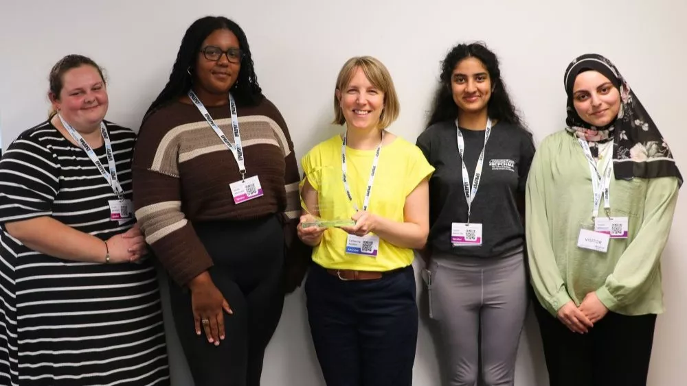 Young people are presented an award