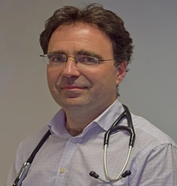 Photograph of Will Carroll, with a stethoscope