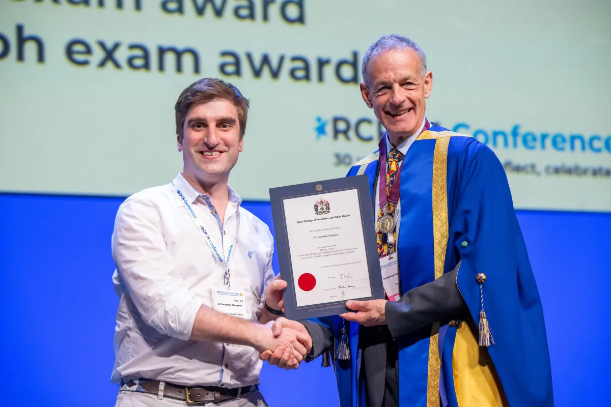 Denney Award Winner receives certificate