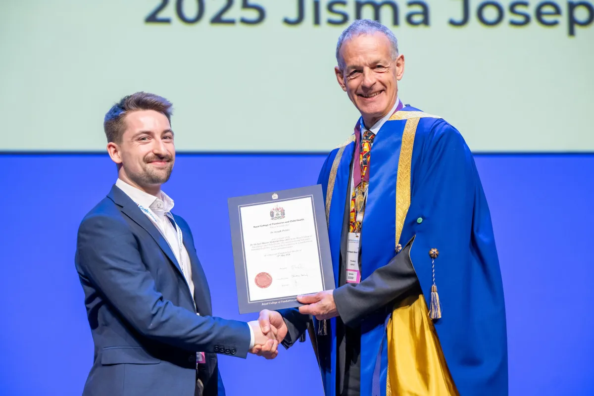 Dr Michael Blacow Memorial Prize Winner accepts Certificate