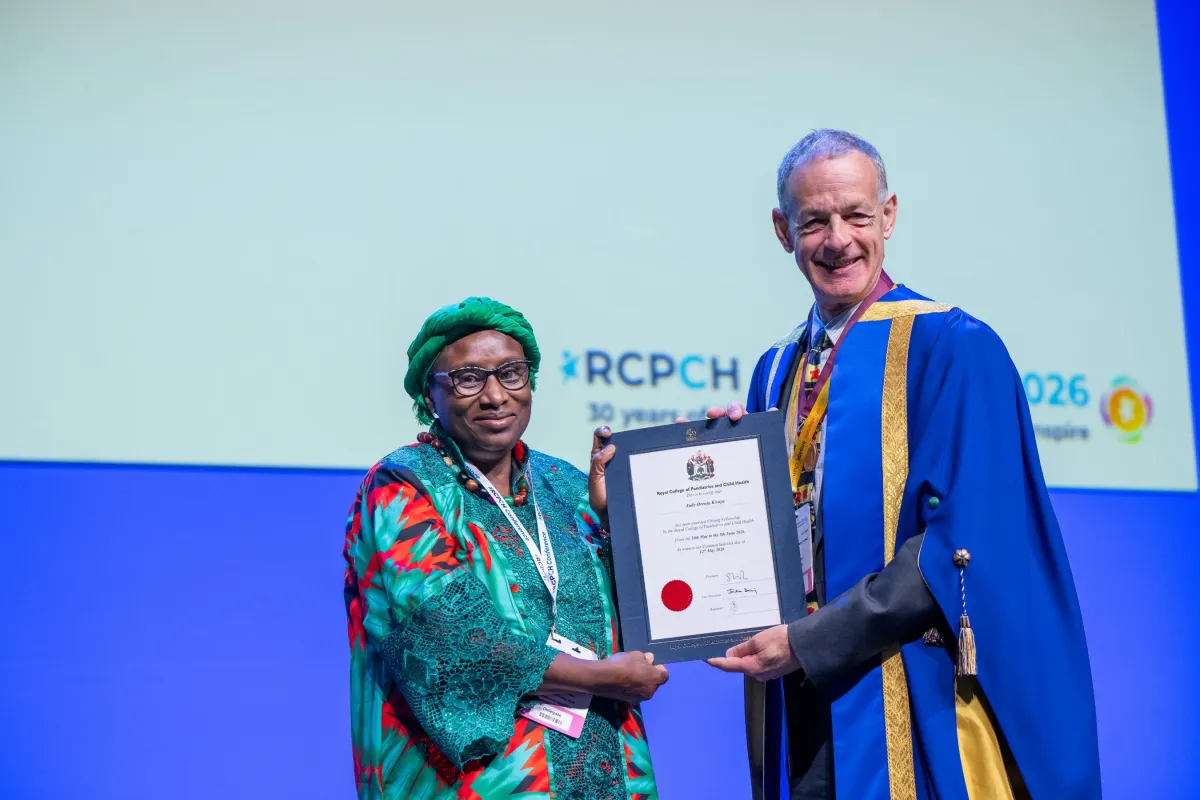 2026 Visiting Fellow Judy Orenja Kivaya recieves certificate