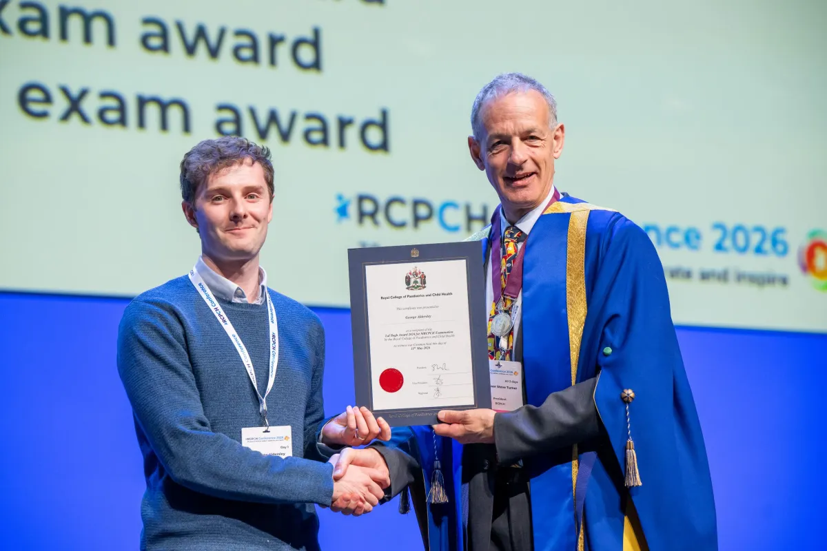 George Aldersley accepts the 2024 Lal Bagh Award certificate