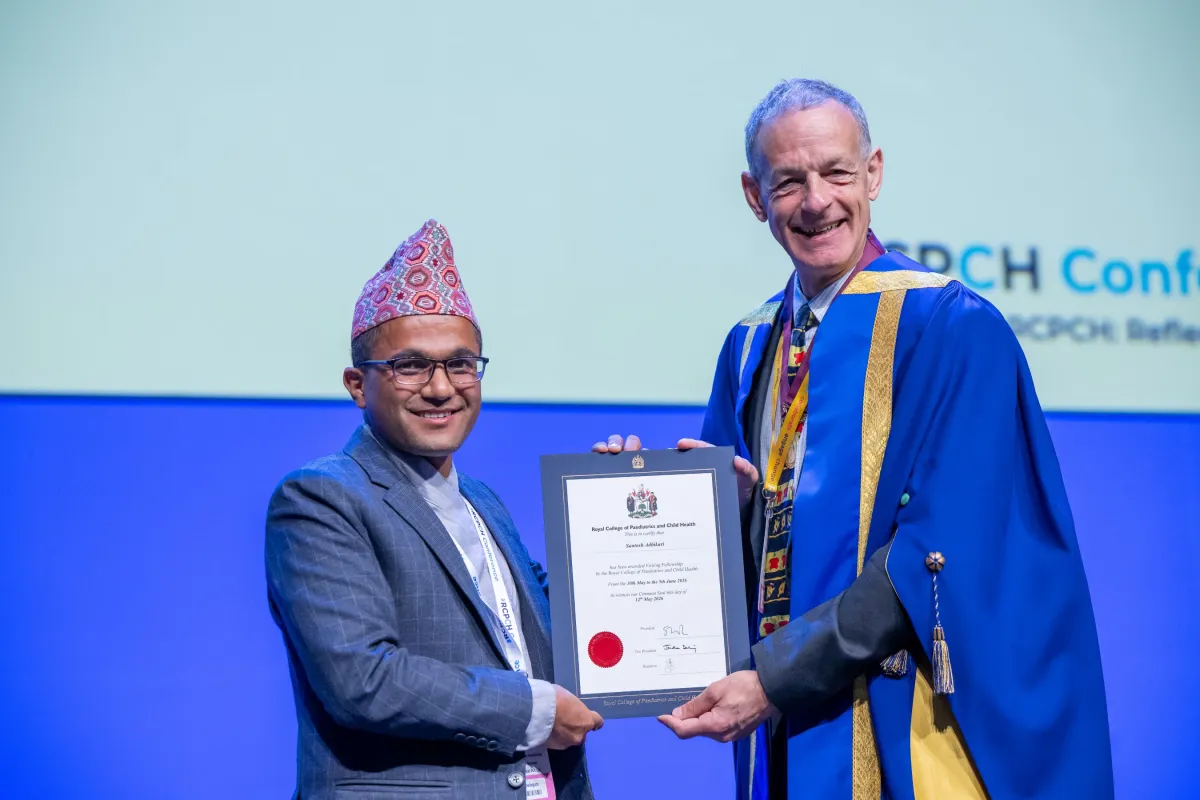 Visiting Fellow Santosh Adhikari accepts certificate