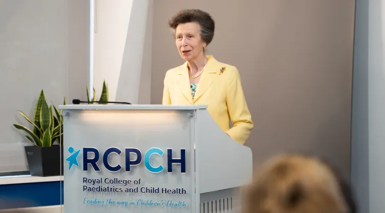 HRH Princess Royal speaking from podium that reads RCPCH Royal College of Paediatrics and Child Health, Leading the way in Children's health