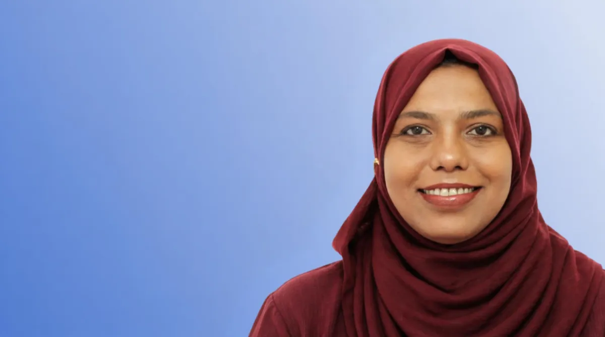 Dr Tamanna Yesmin on a blue background