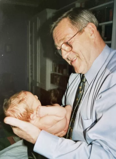 Mike with his grandaughter Eliza in 2002
