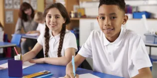 Two school children in a classroom