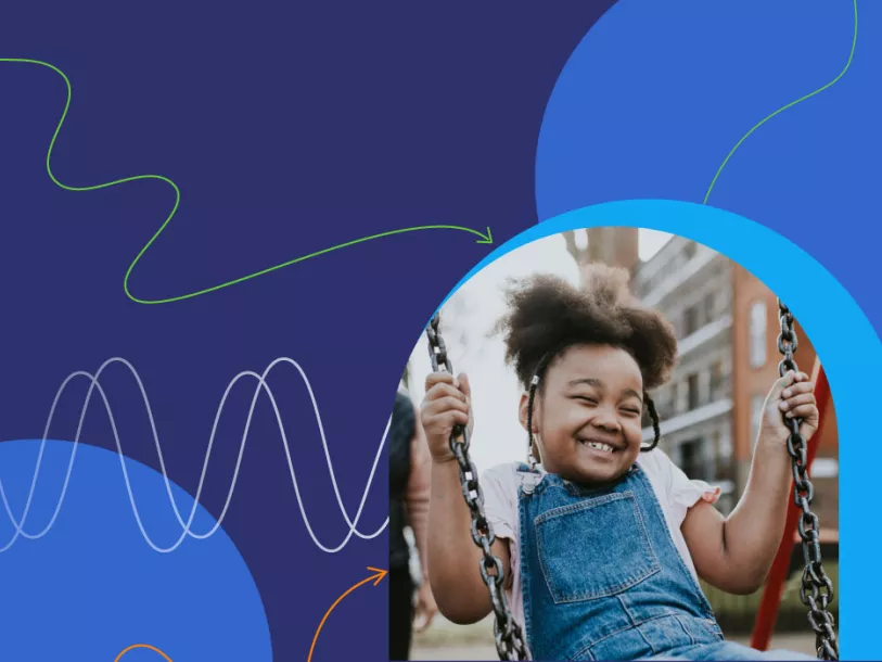 Photo of young girl on swing, smiling - background is blue patches with swirling lines