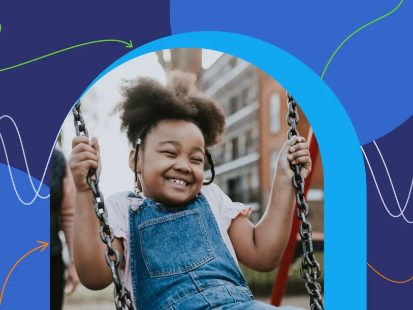 Photo of young girl on swing, smiling - background is blue patches with swirling lines