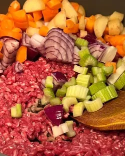 Ingredients for cottage pie: mince, celery, onion, vegetables